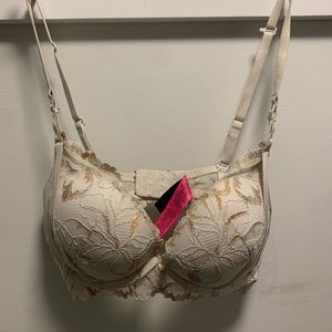 gold and white push up bra